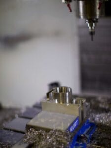 CNC machining one of a series of custom, mini cyclones