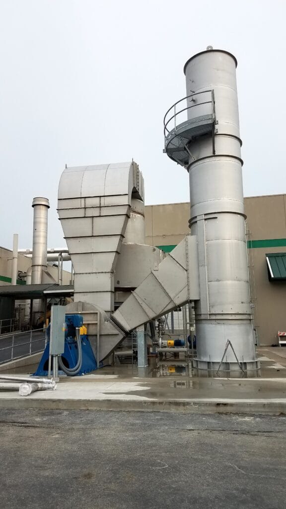 Installed venturi particulate scrubber for filtering VOCs from roasting peanuts.
