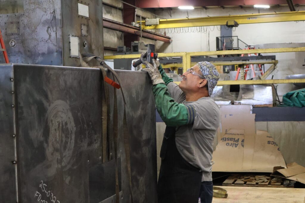 One of our shop technicians assembling the upper section of the fluff hopper.