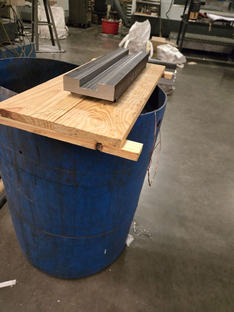 Other side of the custom metal die fabricated for press brake to produce brackets for highway construction project.