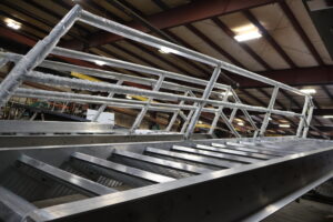Two welded stair assemblies ready to be shipped from the Heumann Environmental fabrication shop.